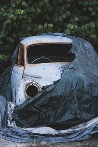 Close-up of abandoned car