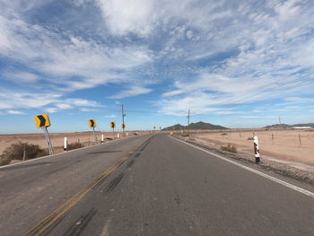 Road by street against sky, hiway