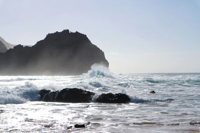 Scenic view of sea against clear sky