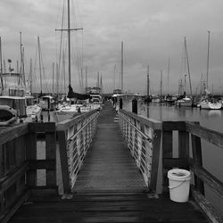 Boats moored at harbor