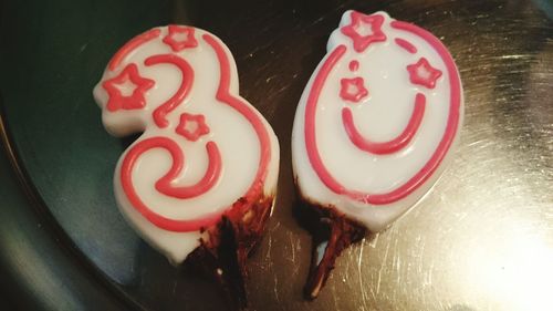 Close-up of red sweet food on table