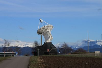 Low angle view of radar against sky