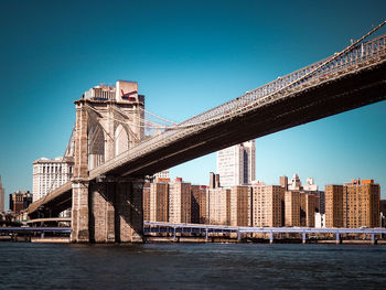 Low angle view of brooklyn bridge, new york city