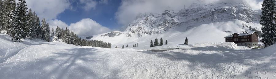 Snow covered mountains against sky