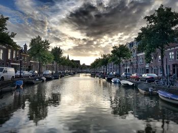 Boats moored in canal