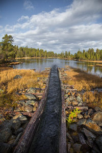 A beautiful autumn scenery of a historic water channel for transporting timber between lakes.
