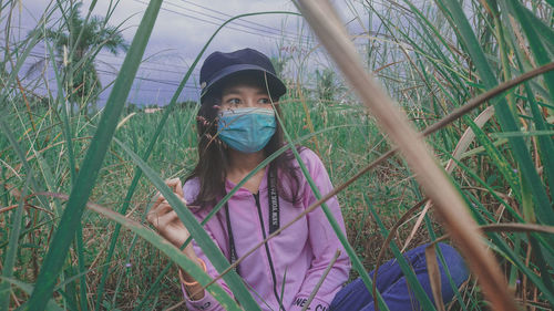 Portrait of girl on field