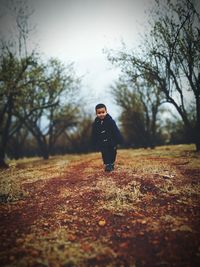 Full length of man on field against sky