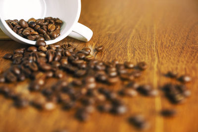 Close-up of coffee beans on table