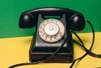 High angle view of telephone on table