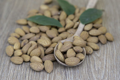 Close-up of roasted coffee beans on table