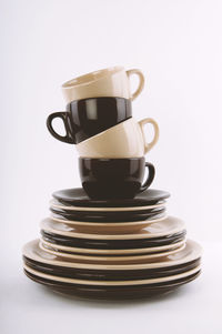 Close-up of coffee cup against white background