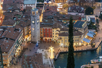 High angle view of illuminated buildings in town