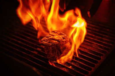Close-up of meat on barbecue grill