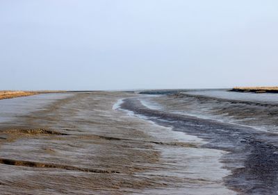 Scenic view of sea against clear sky