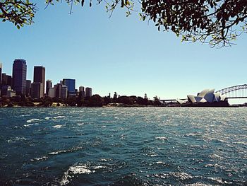 City skyline against blue sky
