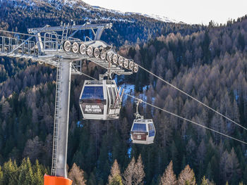 High angle view of overhead cable car against sky