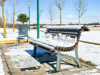 Scenic view of snow covered landscape against sky