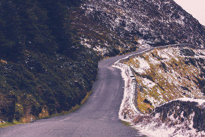 Scenic view of mountain road against sky