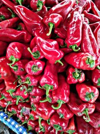 Full frame shot of red chili peppers for sale in market