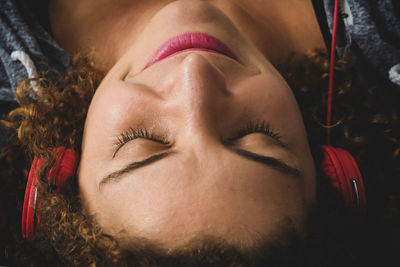 Close-up portrait of woman with eyes closed