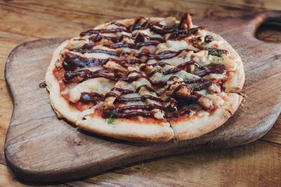 Close-up of pizza on cutting board