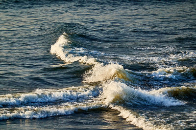 Sea waves splashing on shore