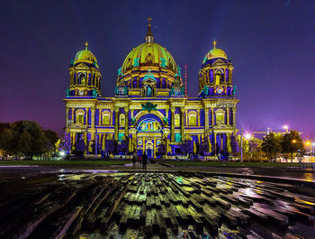 View of city lit up at night