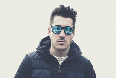 Portrait of young man looking away