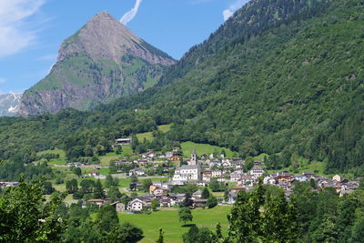 Panoramic view of townscape against mountains