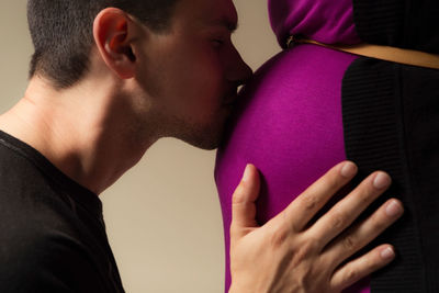 Close-up portrait of young couple