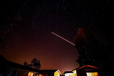 Low angle view of stars in sky at night