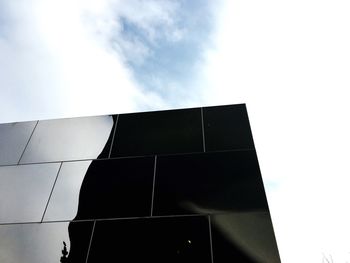 Low angle view of modern building against sky