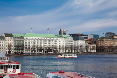 Tourist boats at the inner alster lake in hamburg