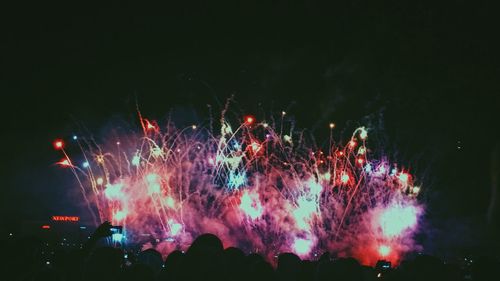 Firework display at night