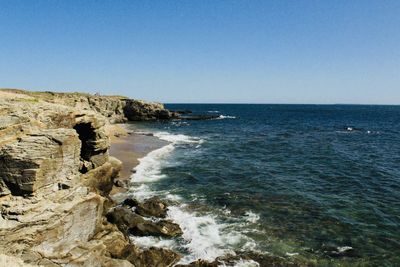 Scenic view of sea against clear sky