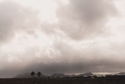 Scenic view of desert against sky