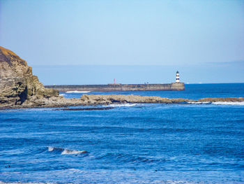 Scenic view of sea against clear sky