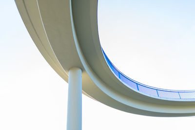 Low angle view of metallic structure against clear sky
