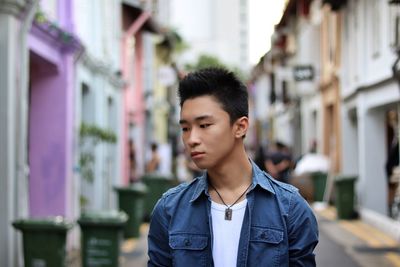 Portrait of young man outdoors