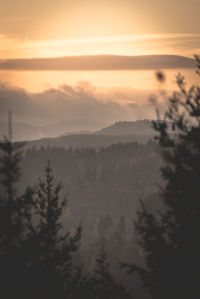 Scenic view of mountains against sky during sunset