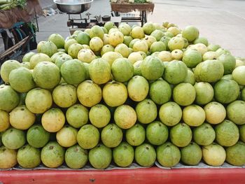 Stack of fruits for sale at market stall