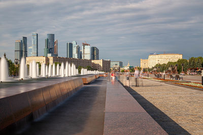 View of buildings in city against sky