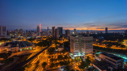 High angle view of cityscape against sky during sunset