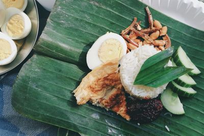 High angle view of food served on banana leaf