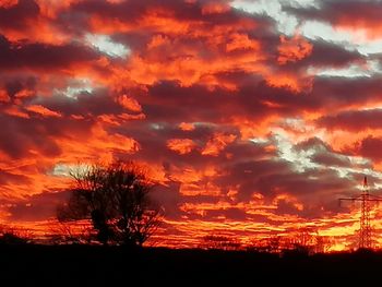 Scenic view of dramatic sky during sunset