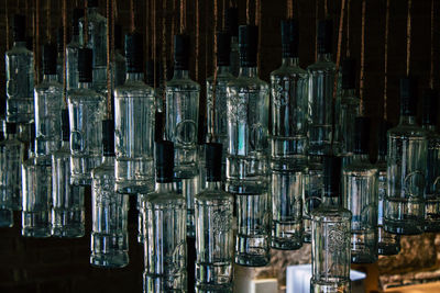 Close-up of glass bottles on table