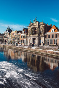 Reflection of buildings in canal