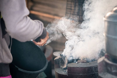 Cropped image of woman preparing food