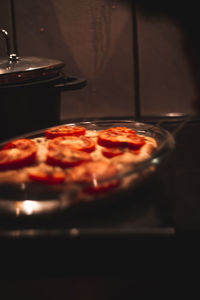 Close-up of pizza on table in restaurant